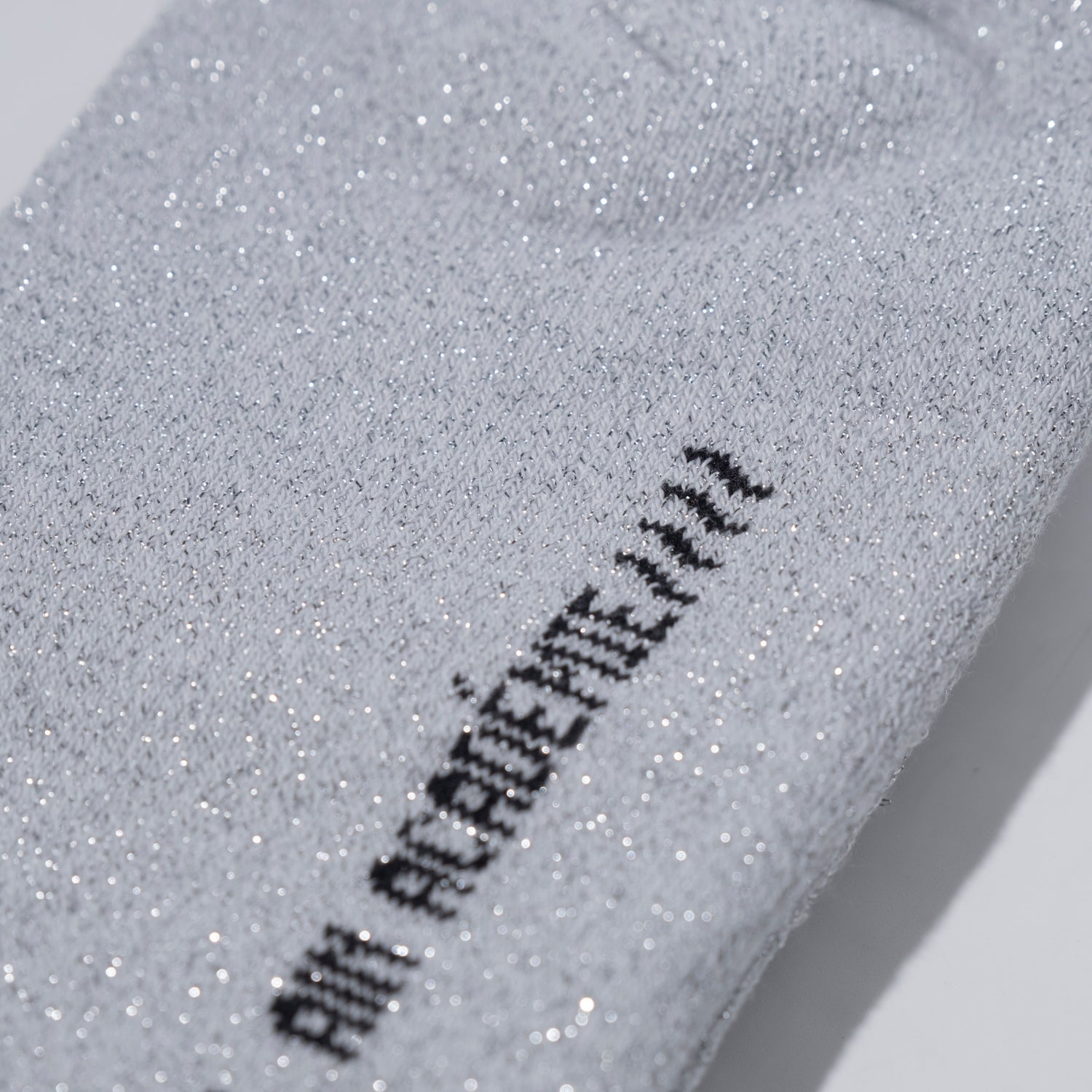 A_PAIR OF SILVER SOCKS - Al Ain Académie