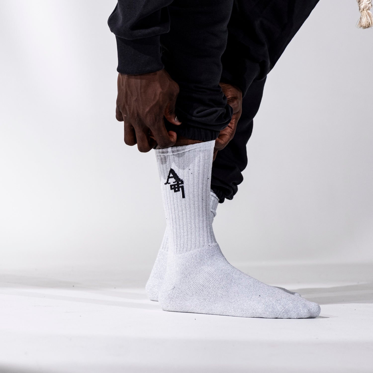 A_PAIR OF SILVER SOCKS - Al Ain Académie