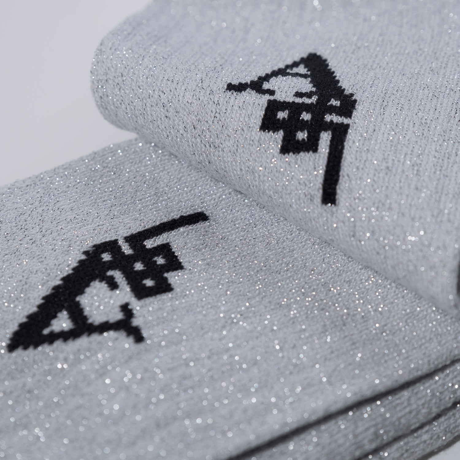 A_PAIR OF SILVER SOCKS - Al Ain Académie