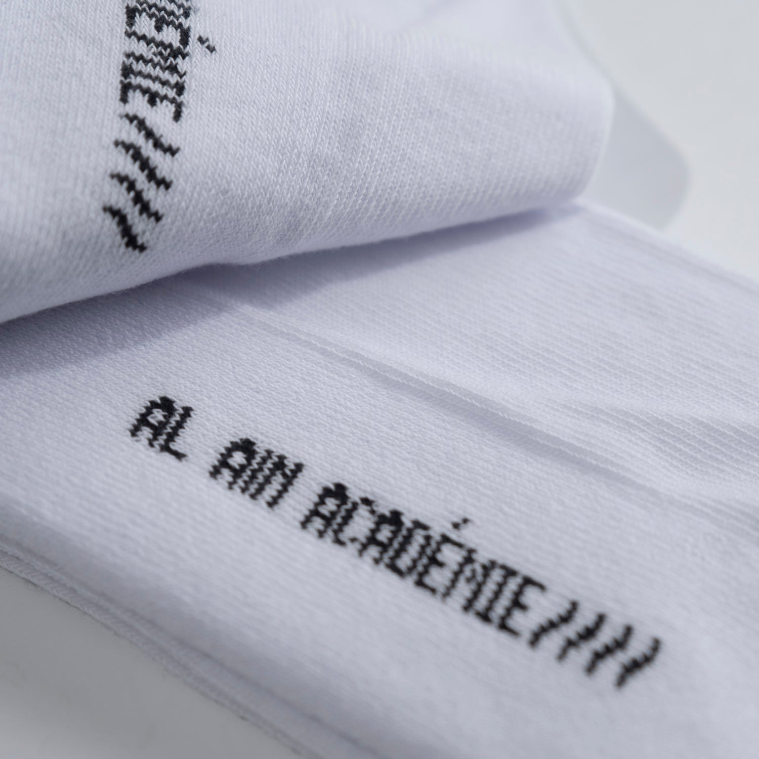 A_PAIR OF WHITE SOCKS - Al Ain Académie