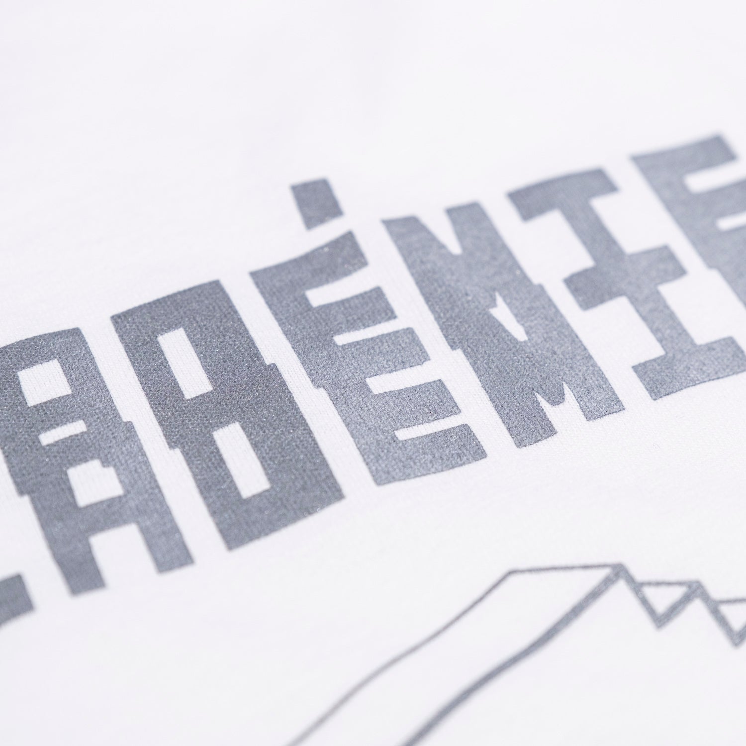 ACADÉMIE OBJECTS_TEE WHITE - Al Ain Académie